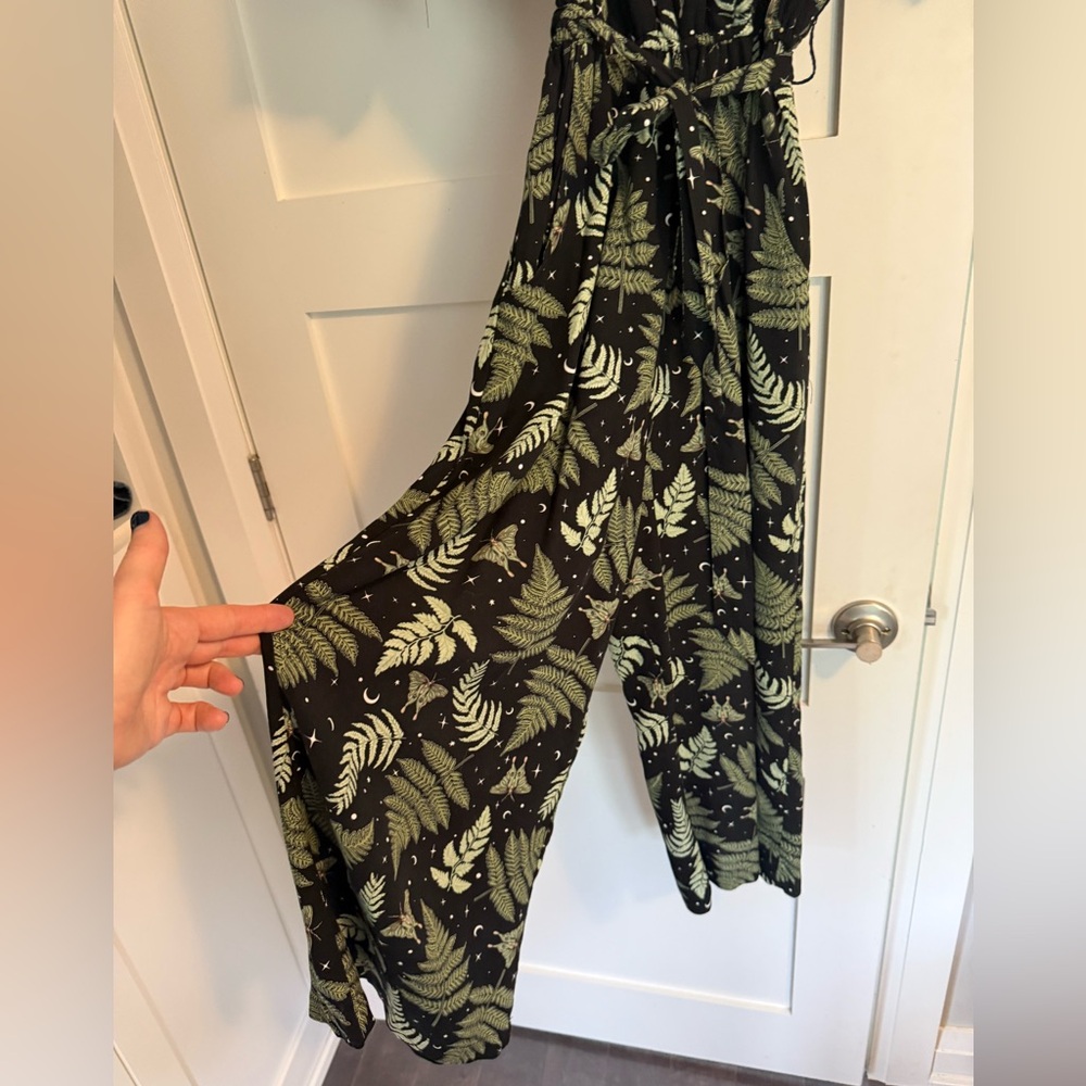 Hell Bunny Tropical Leaf Pattern Wide leg jumpsuit with pockets.